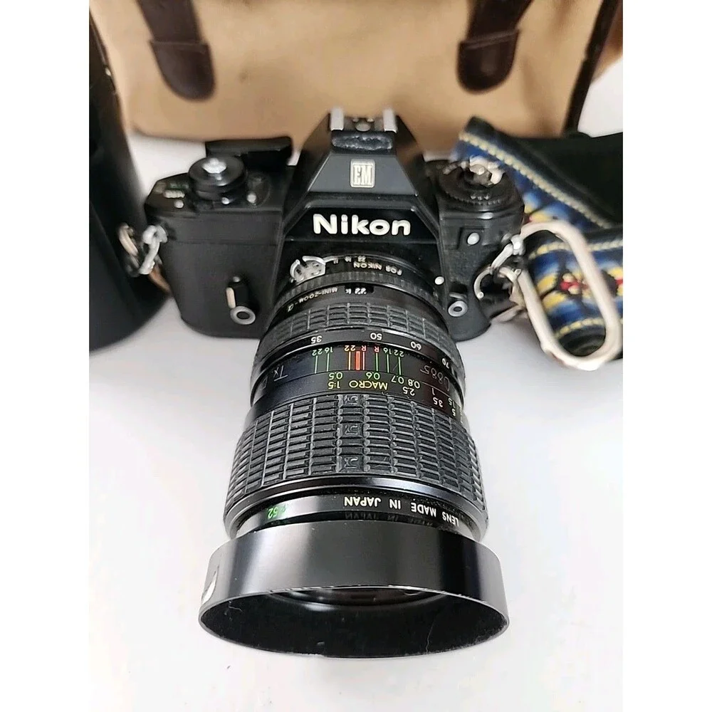 Nikon EM 35mm SLR Film Camera Black Body w/ Extra Lens, Bag & Accessorie